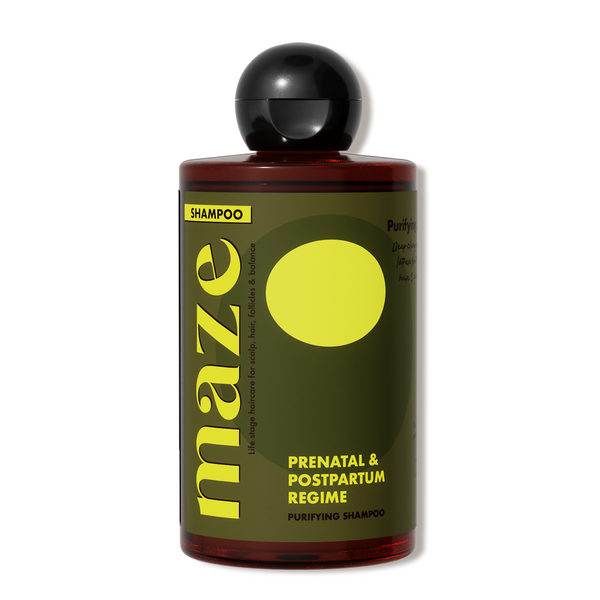 Bottle of Maze shampoo with a black cap on a white background